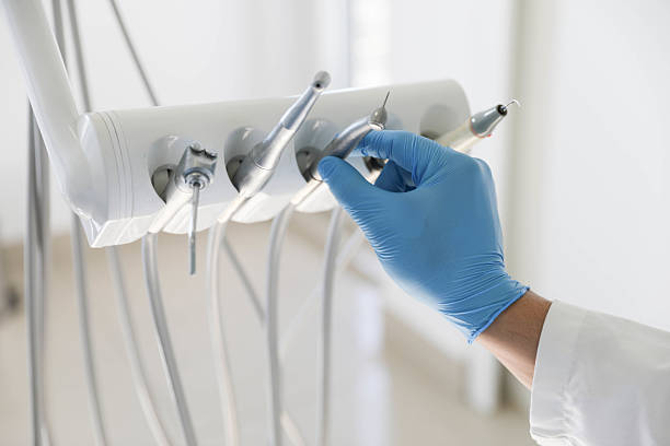 Professional Tooth Extraction technician working in New Concord, OH